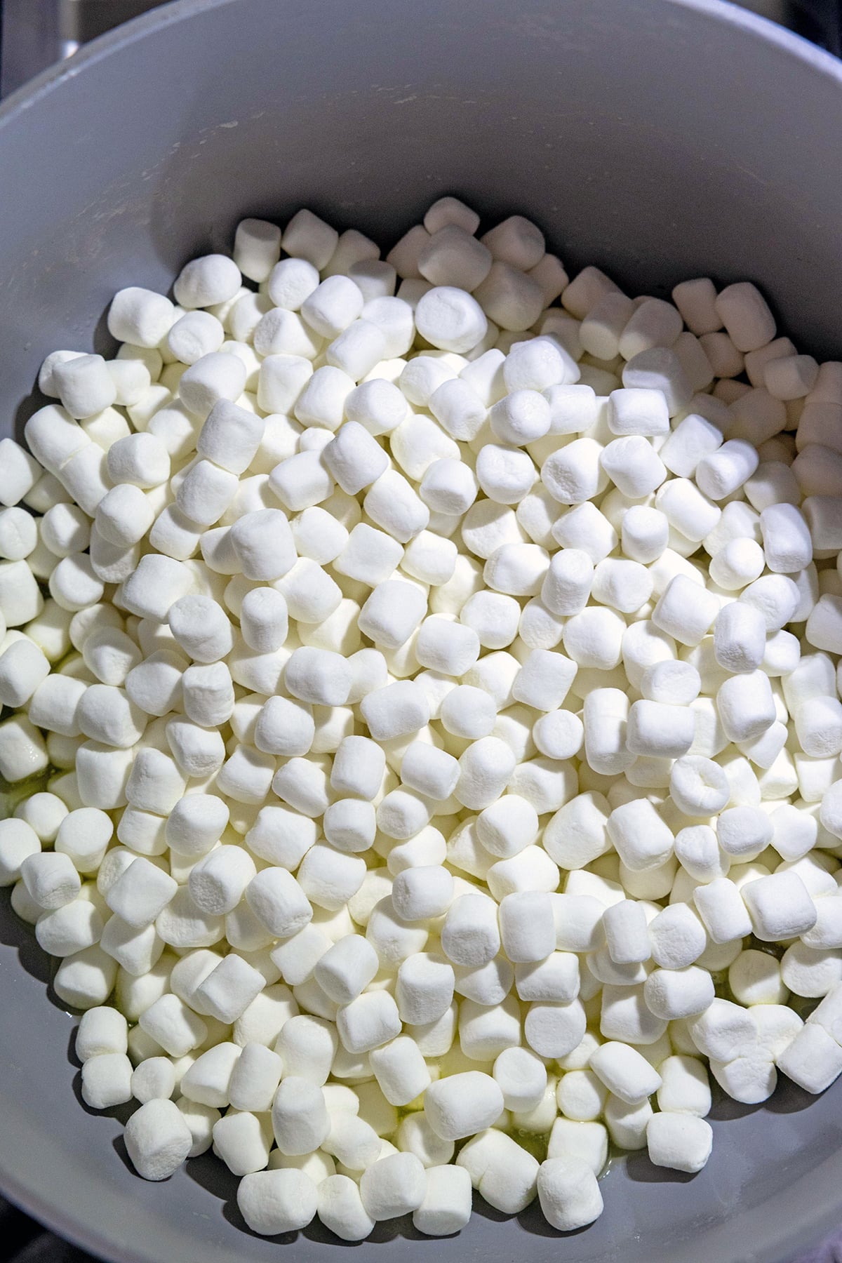 Mini marshmallows in a saucepan.