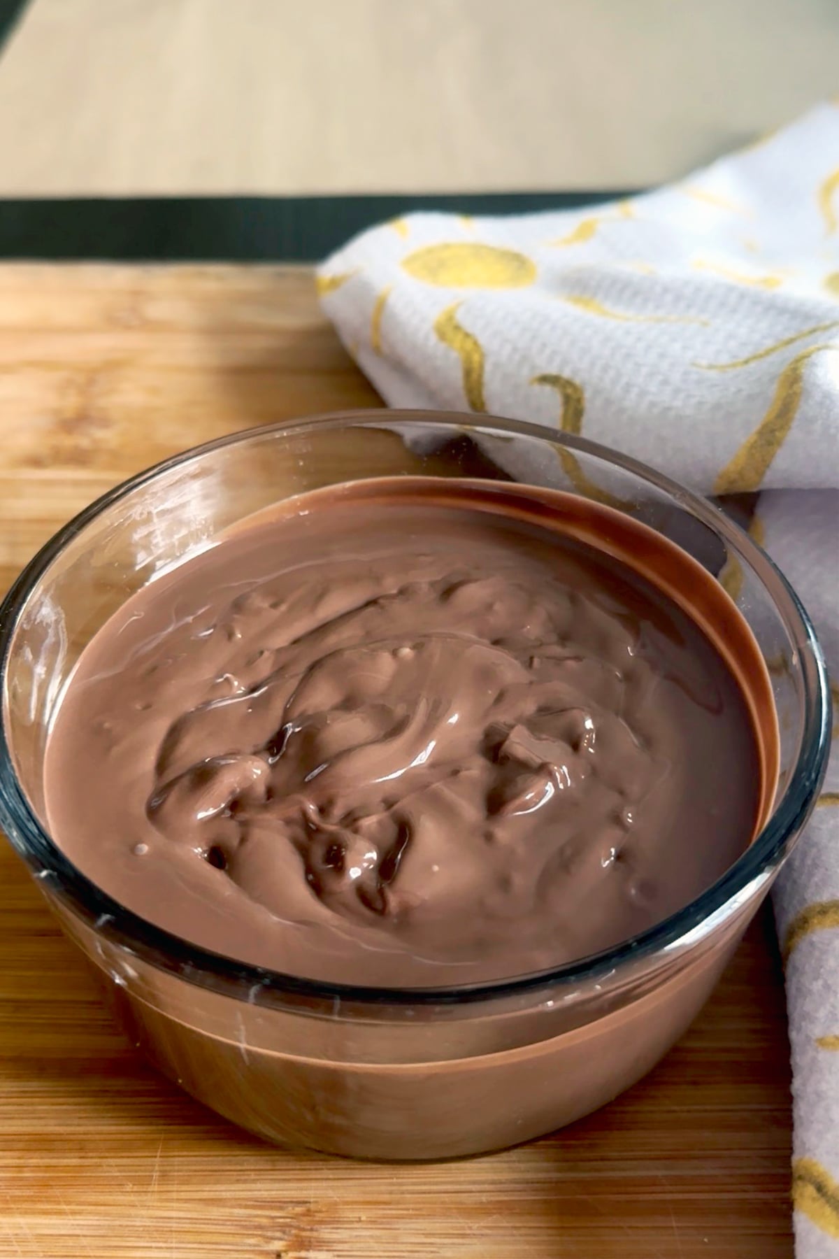 Melted chocolate in a small bowl.