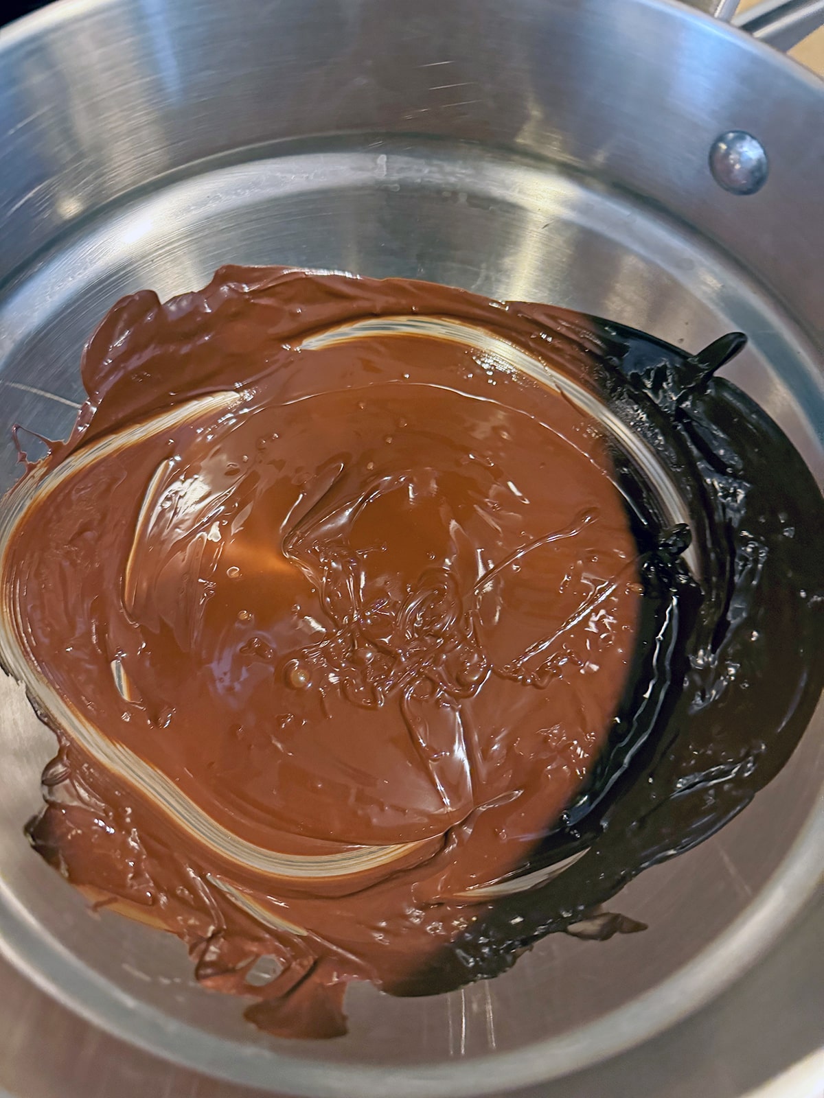 Chocolate melted in double boiler.