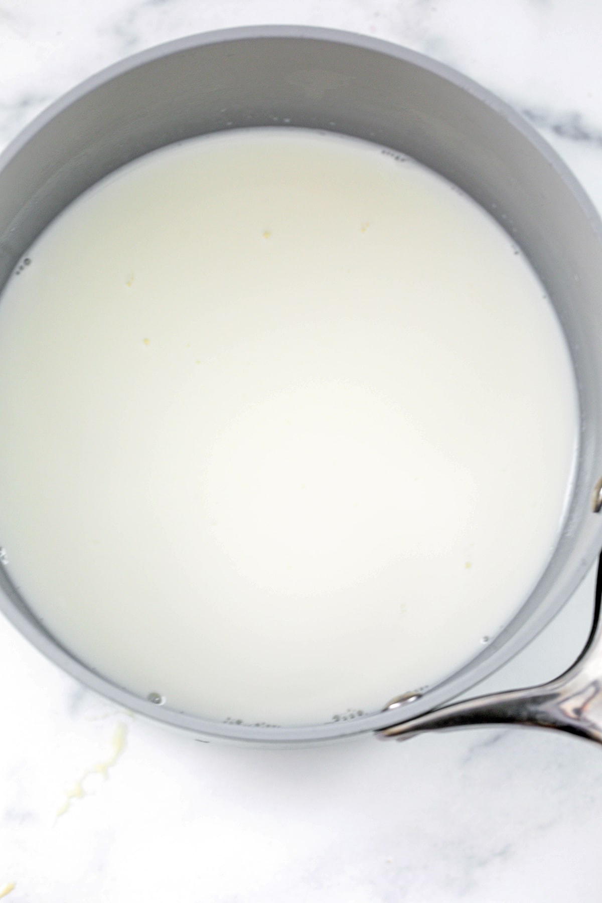 Milk in saucepan.