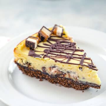 Closeup view of Milky Way cheesecake on a plate.