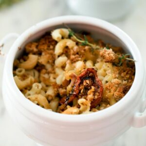 Lighter macaroni and cheese -- This recipe has all the elements and flavors of a classic mac and cheese, but with a little bit of a healthier kick, thanks to roasted tomatoes and whole wheat breadcrumbs | wearenotmartha.com