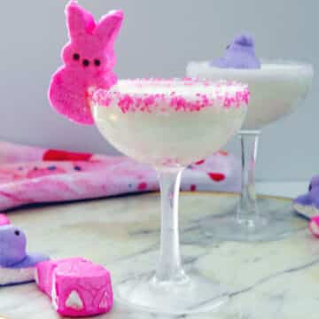 Closeup of Peeps martini with pink sanding sugar and bunny Peep garnish.