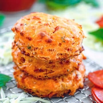Closeup view of a stack of pepperoni pizza biscuits.