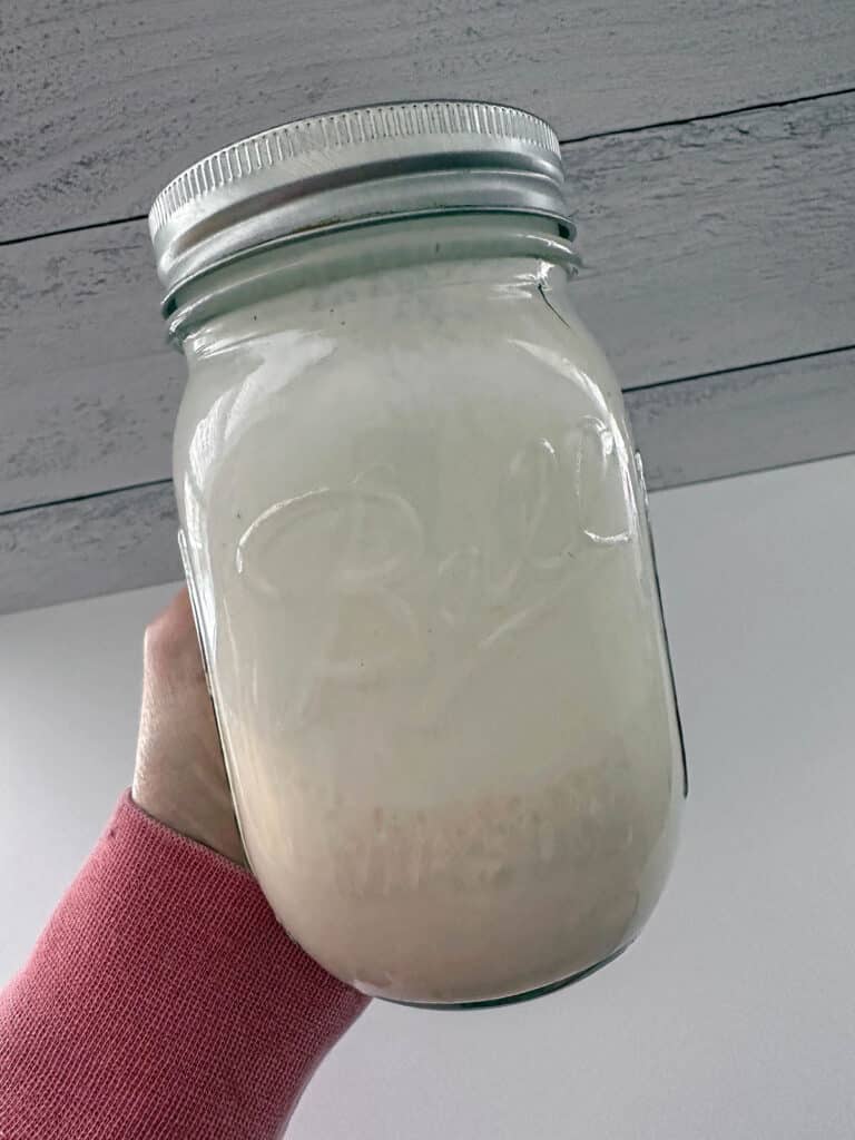 Pistachio sweet cream in a mason jar.