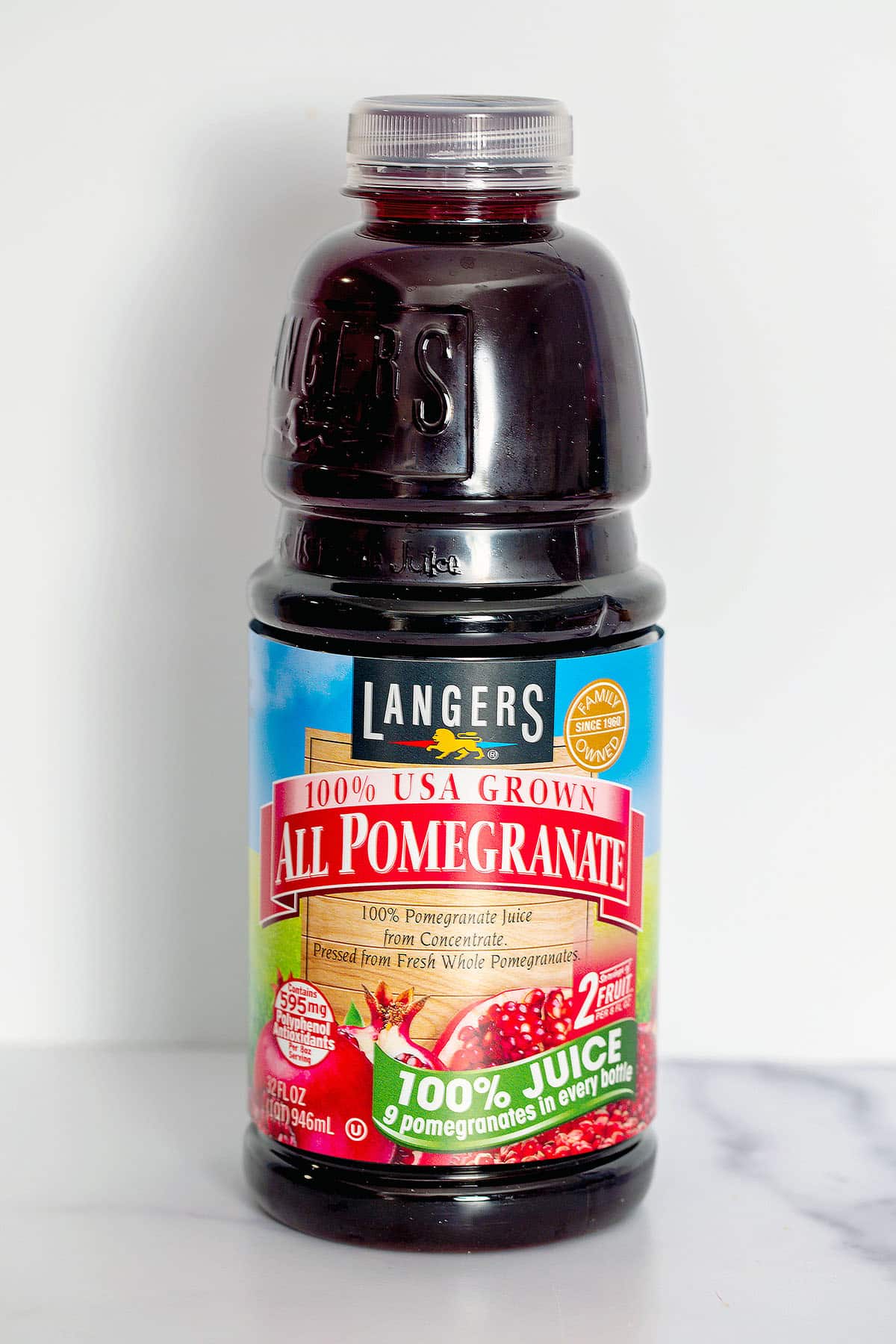 Pomegranate juice in bottle.
