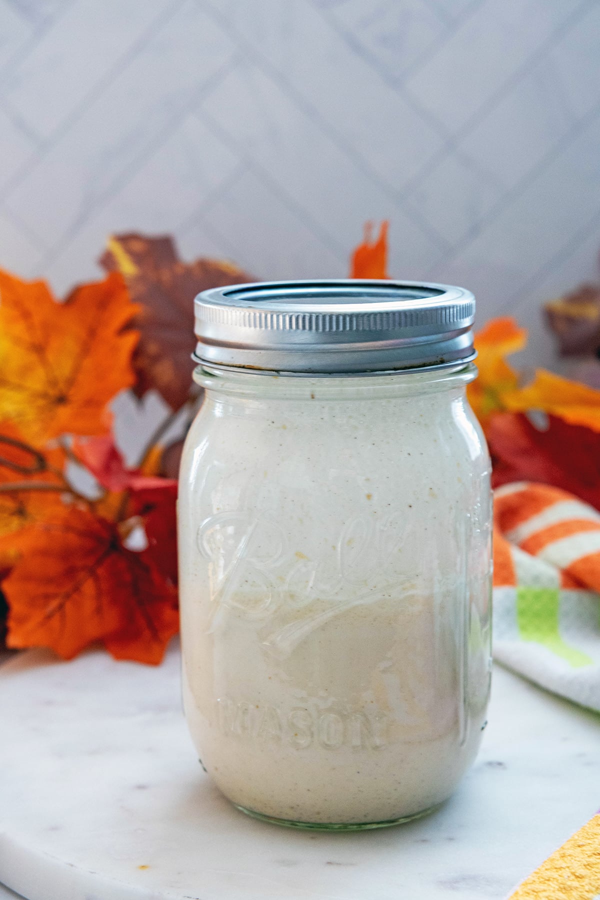 Pumpkin cold cream in mason jar.