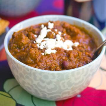 Closeup view of a bowl of pumpkin red wine chili.