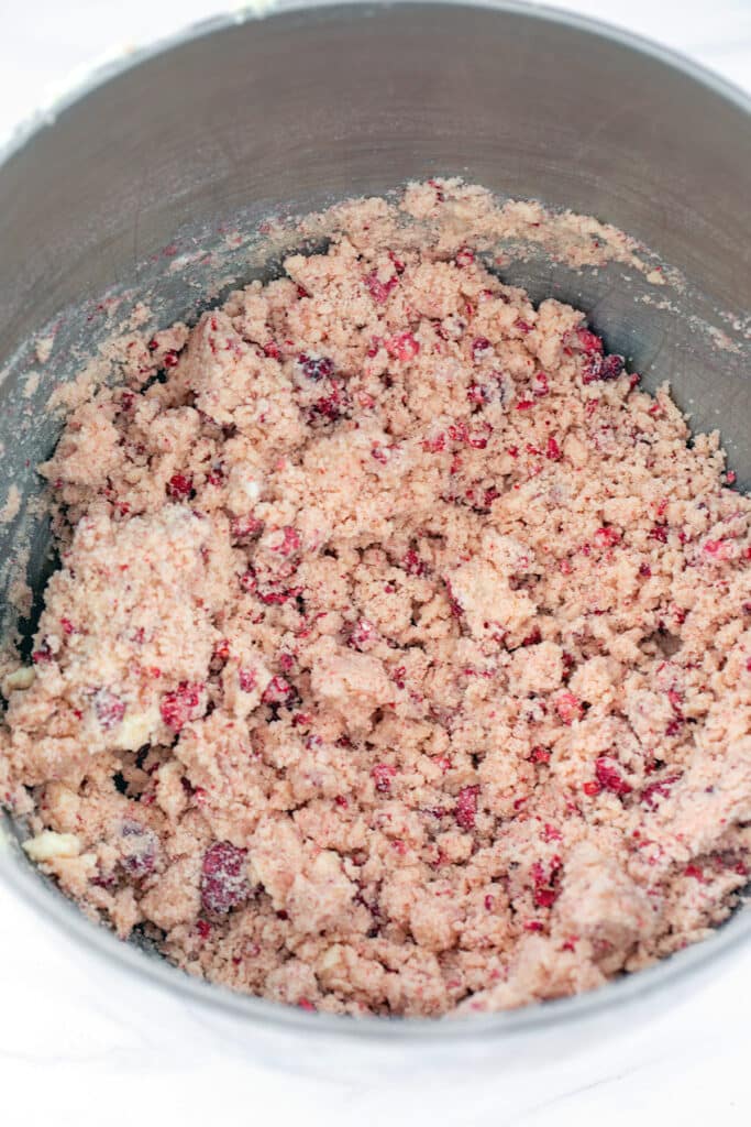 Raspberry shortbread cookie dough in mixing bowl.
