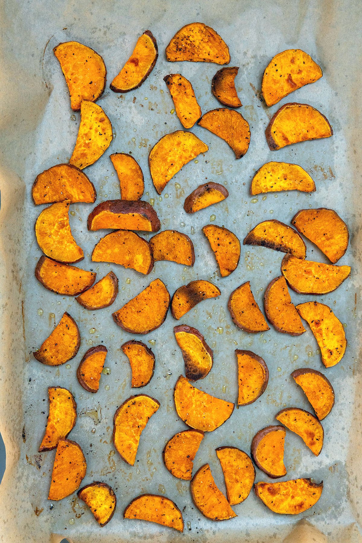 Roasted sweet potatoes on baking sheet.