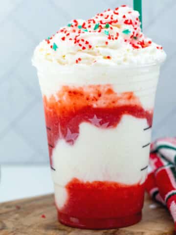 Red and white Santa Claus Frappuccino in a Starbucks cup.