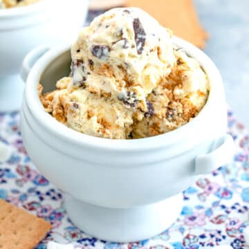 Closeup view of s'mores ice cream in a white bowl.