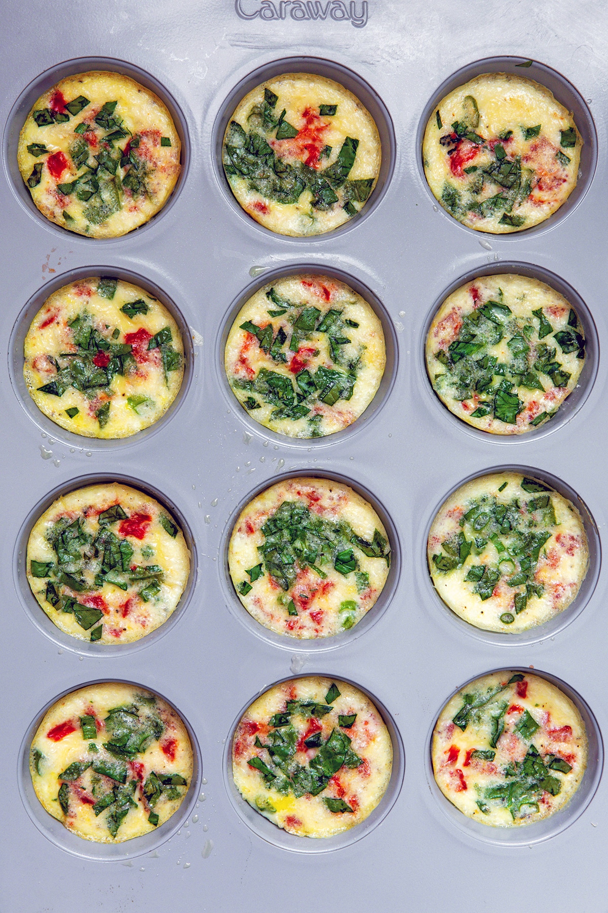 Roasted red pepper and spinach egg white bites baked in muffin tin.