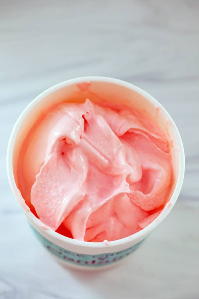 Soft Starburst ice cream in quart container.