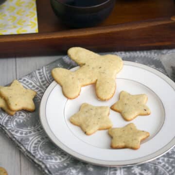 Closeup view of Tazo tea cookies shaped like stars and planes.