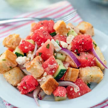 Closeup view of a watermelon panzanella salad.