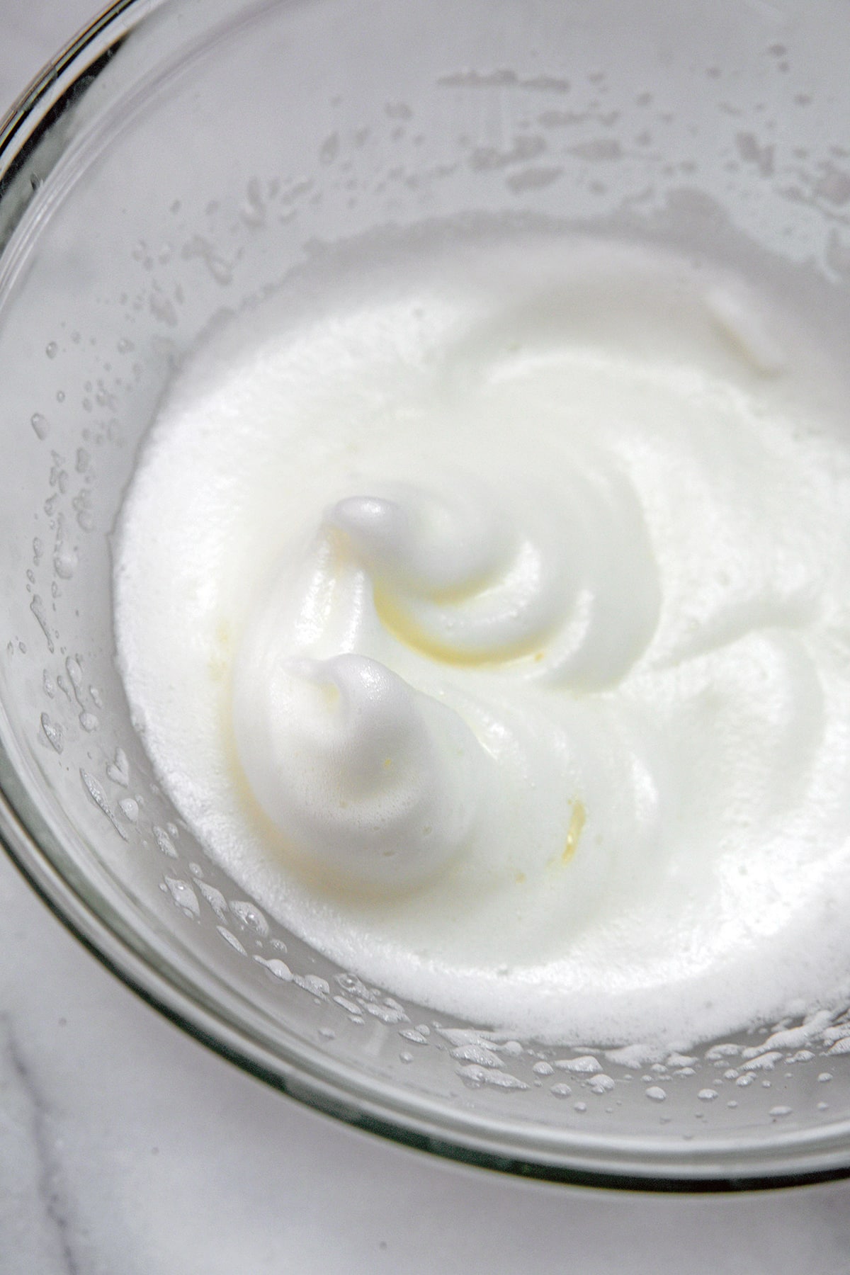 Egg whites beaten into soft peaks.