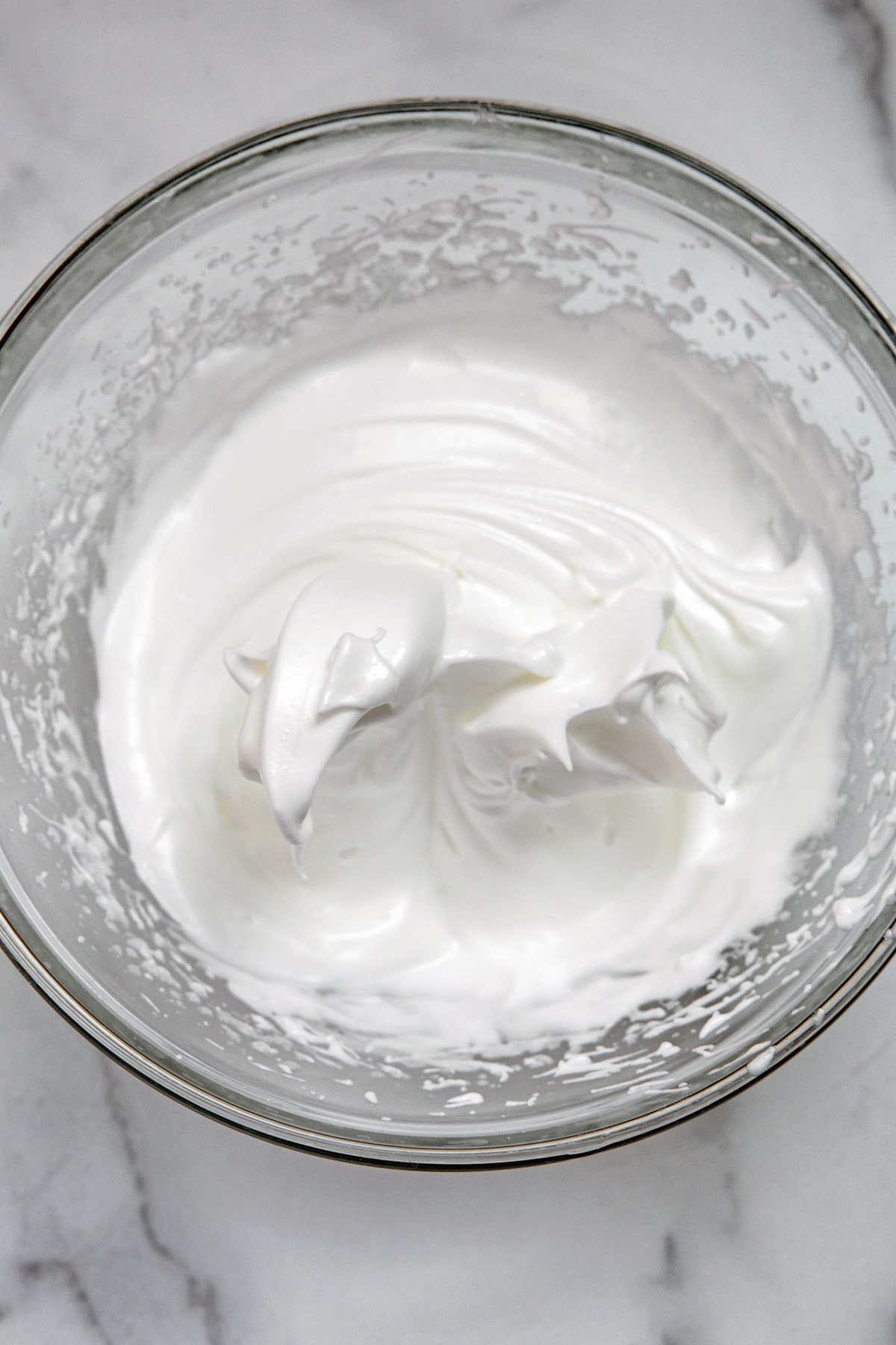 Egg whites beaten into stiff peaks.