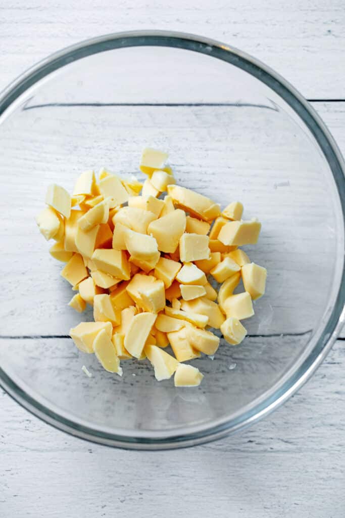 Chopped white chocolate in small bowl.