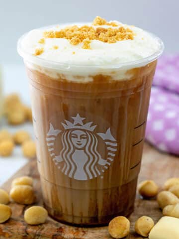 White chocolate macadamia cream cold brew in Starbucks cup.